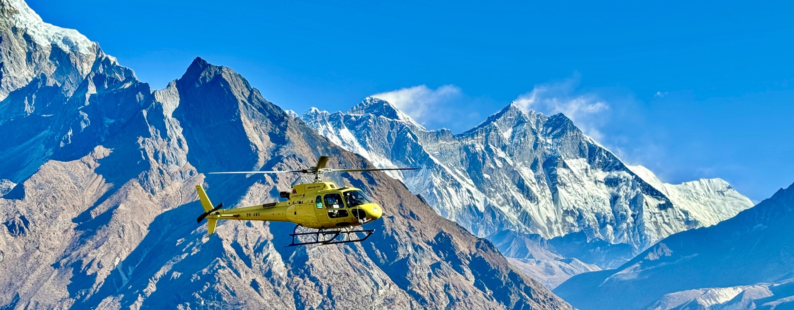 Rescue helicopter flying over the Himalayas
